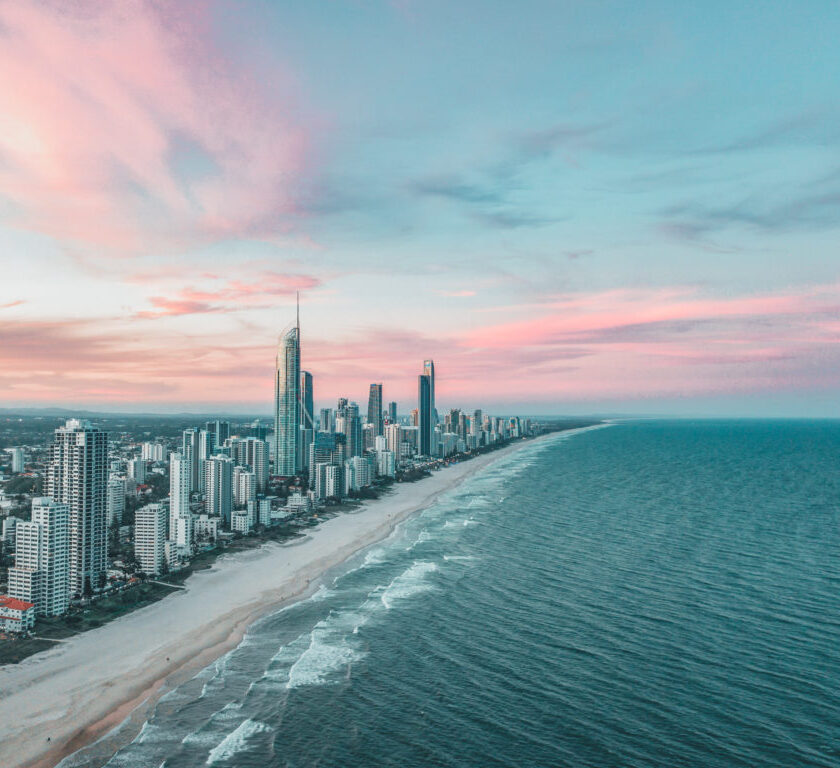 Surfers Paradise skyline aerial view at sunset with a pink sky
